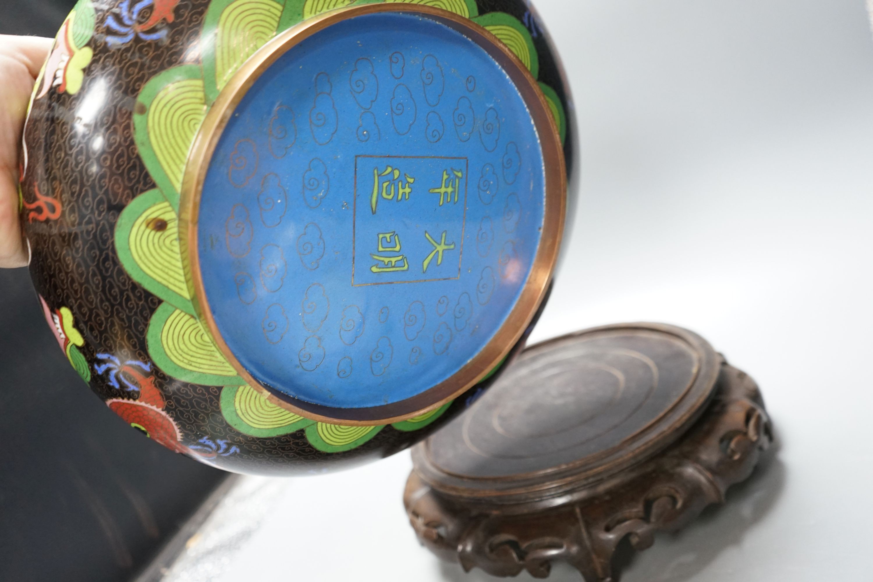 A large early 20th century Chinese cloisonné enamel ‘dragon’ bowl and two Chinese Tongzhi celadon ground famille rose bowls 31cm